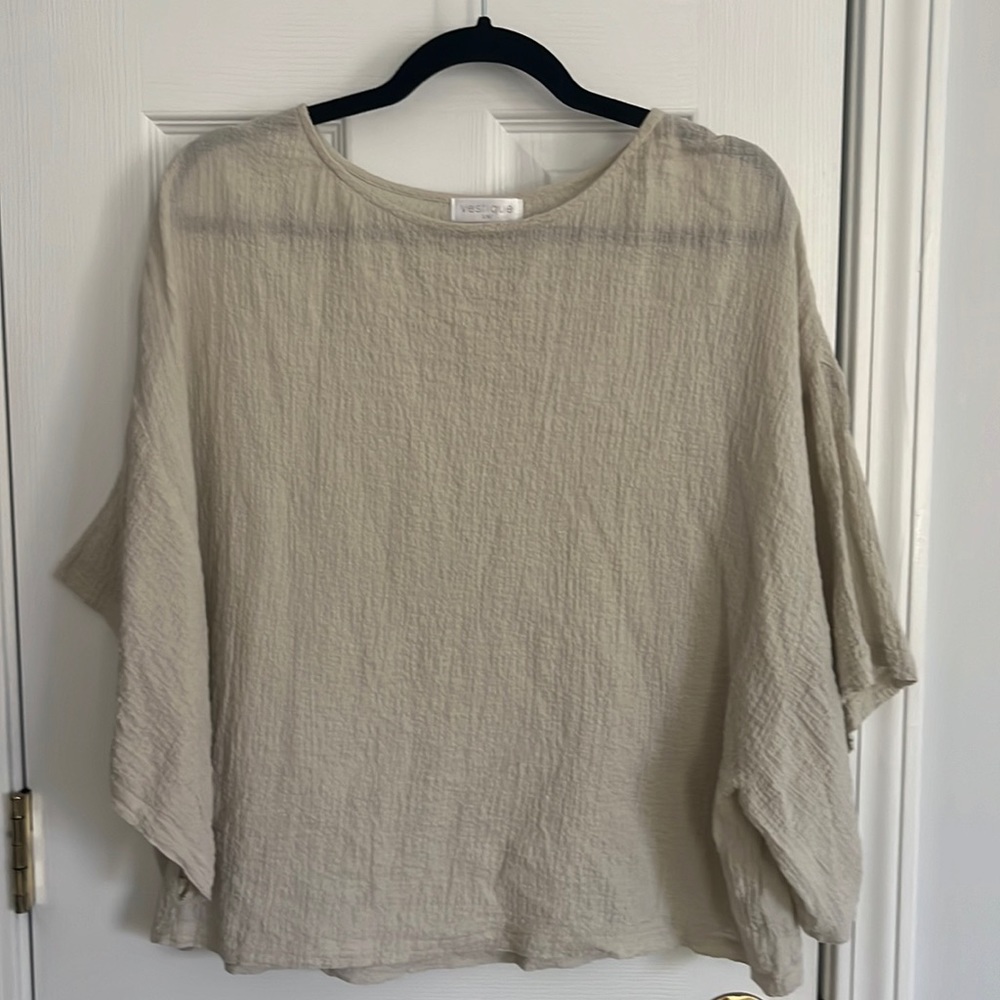 Green, loose fitting short sleeve shirt